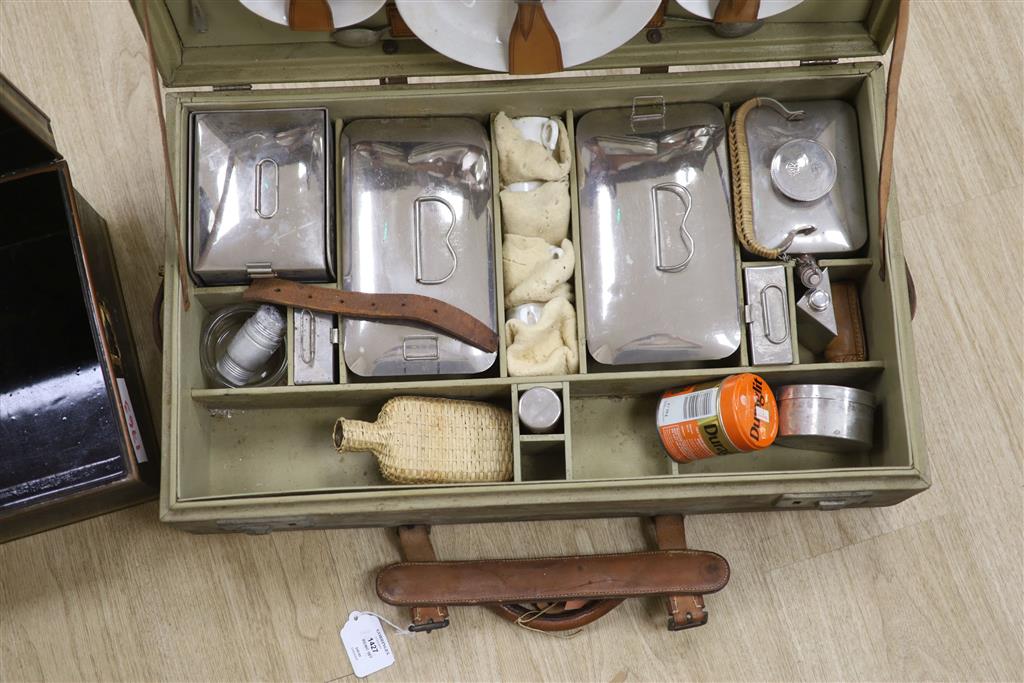 A 1930s picnic set, in a canvas covered case (incomplete)